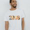 Smiling man wearing a stylish white t-shirt with colorful "2018" graphic print
